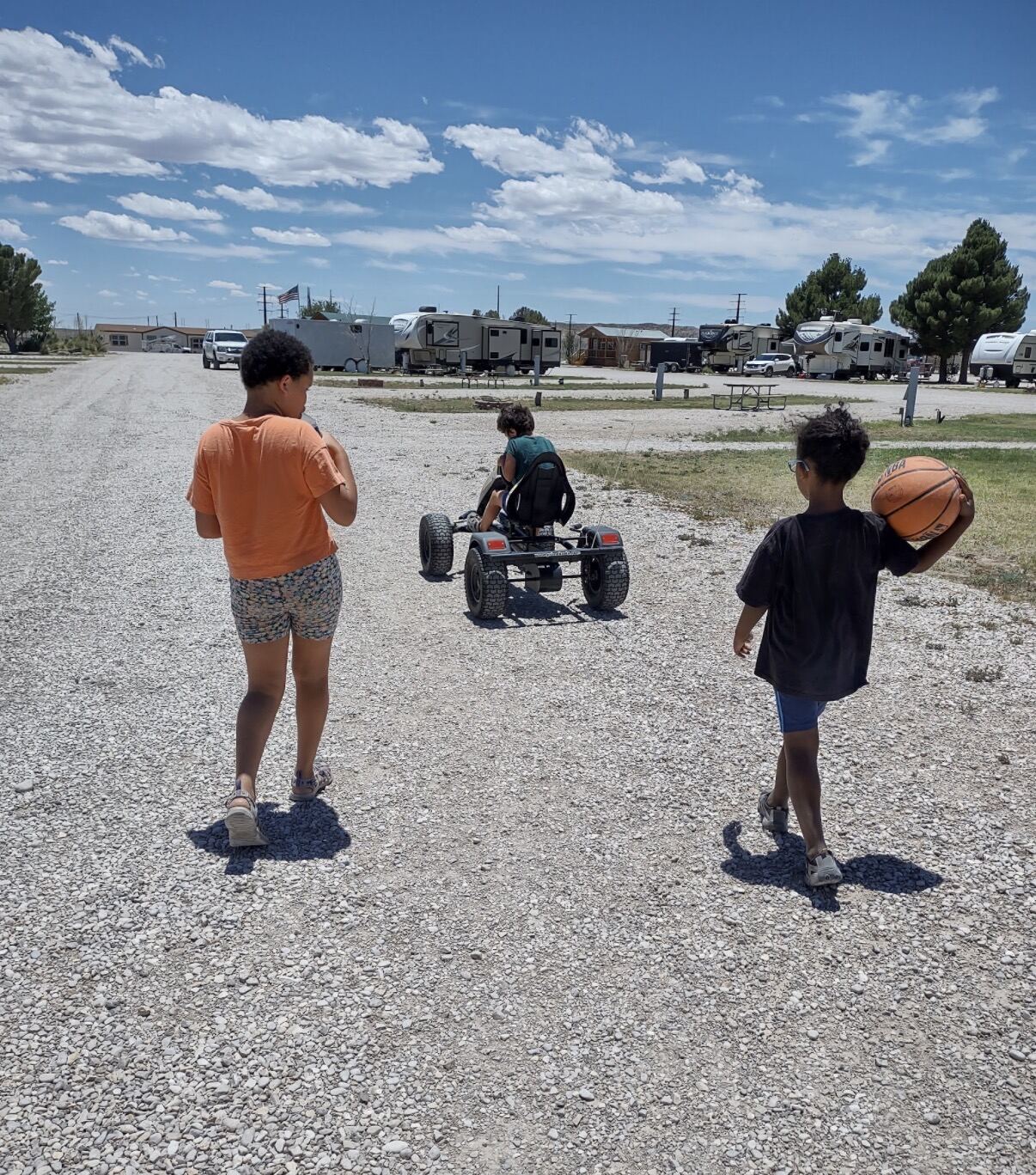 Victoria's kids playing outdoors in New Mexico